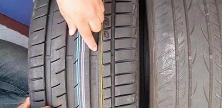 Hình ảnh so sánh lốp xe bị mòn không đều ở giữa do bơm quá căng và lốp mòn đều đúng chuẩn