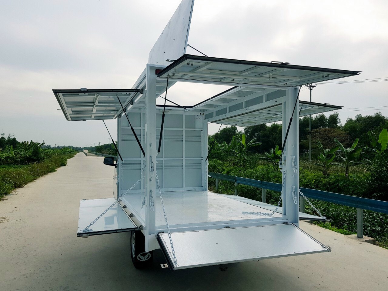 Xe tải Kenbo thùng cánh dơi mở nóc 990kg - Xe bán hàng lưu động